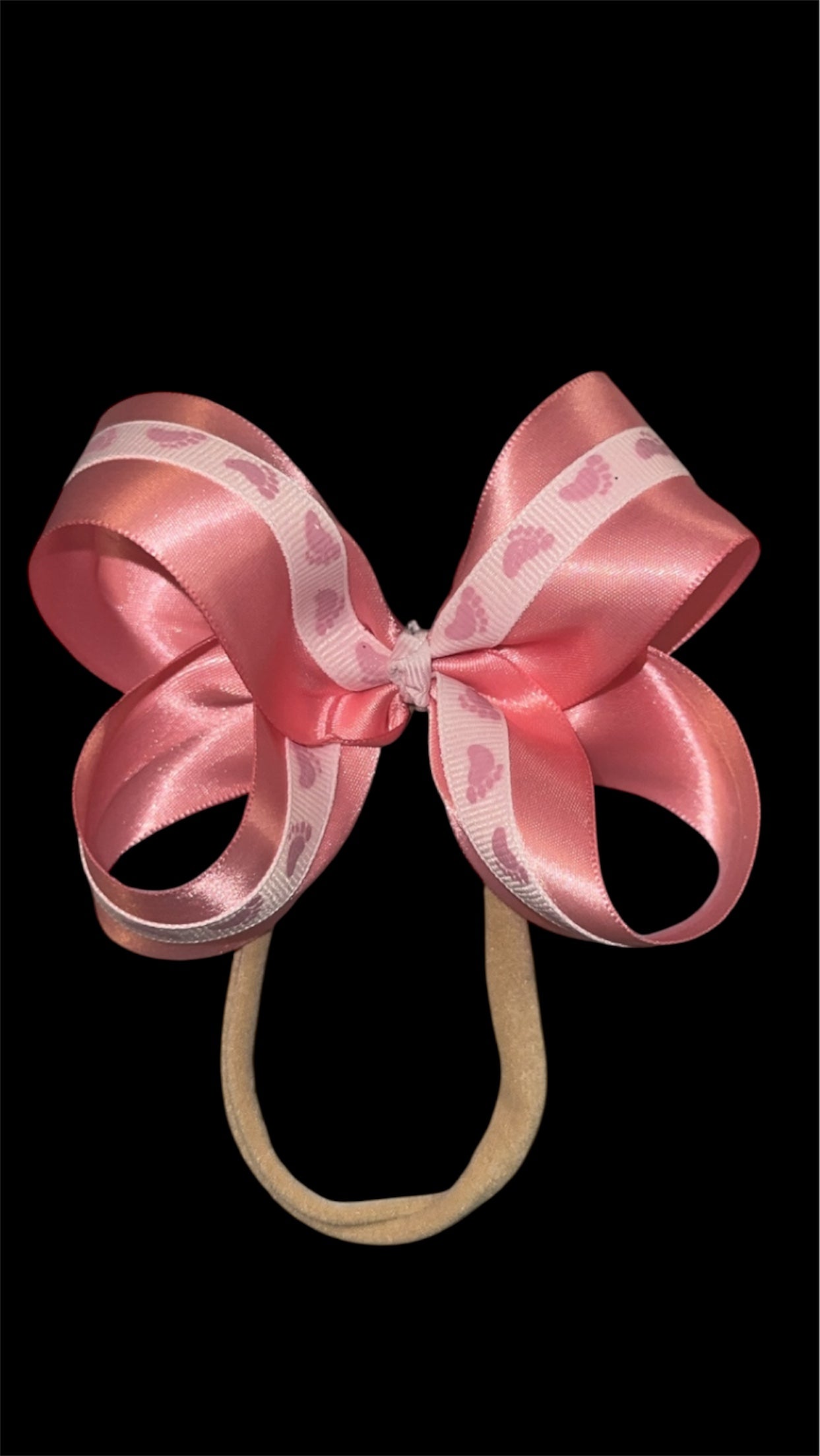 Baby girl footprints ribbon